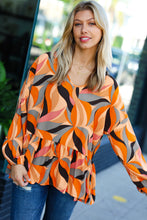 Load image into Gallery viewer, In My Thoughts Rust Abstract V Neck Peplum Top