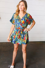 Load image into Gallery viewer, Navy Tropical Floral Surplice Romper