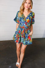 Load image into Gallery viewer, Navy Tropical Floral Surplice Romper