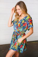 Load image into Gallery viewer, Navy Tropical Floral Surplice Romper