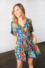Load image into Gallery viewer, Navy Tropical Floral Surplice Romper