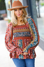 Load image into Gallery viewer, Teal &amp; Rust Smocked Floral Ruffle Hem Top