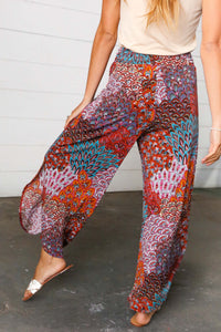 Burnt Orange Geo Print Smocked Waist Slit Palazzo Pants