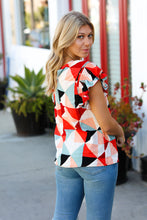 Load image into Gallery viewer, Ivory &amp; Burnt Orange Geo Print Smocked Ruffle Frill Sleeve Top