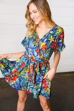 Load image into Gallery viewer, Navy Tropical Floral Surplice Romper