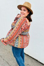 Load image into Gallery viewer, Teal &amp; Rust Smocked Floral Ruffle Hem Top