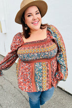 Load image into Gallery viewer, Teal &amp; Rust Smocked Floral Ruffle Hem Top