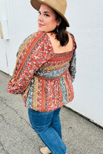 Load image into Gallery viewer, Teal &amp; Rust Smocked Floral Ruffle Hem Top