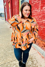 Load image into Gallery viewer, In My Thoughts Rust Abstract V Neck Peplum Top