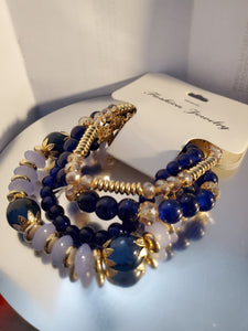 Gold Tone Multi Strand Stretch Bracelet - Unique Inspirations by Tracy and Anna