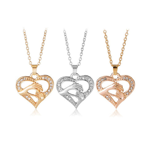 HANDS AND HEART NECKLACE - Unique Inspirations by Tracy and Anna