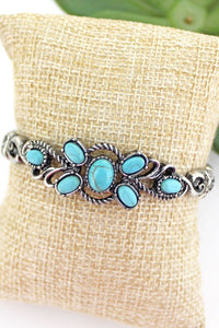 MAYETTA TURQUOISE AND SILVERTONE STRETCH BRACELET - Unique Inspirations by Tracy and Anna